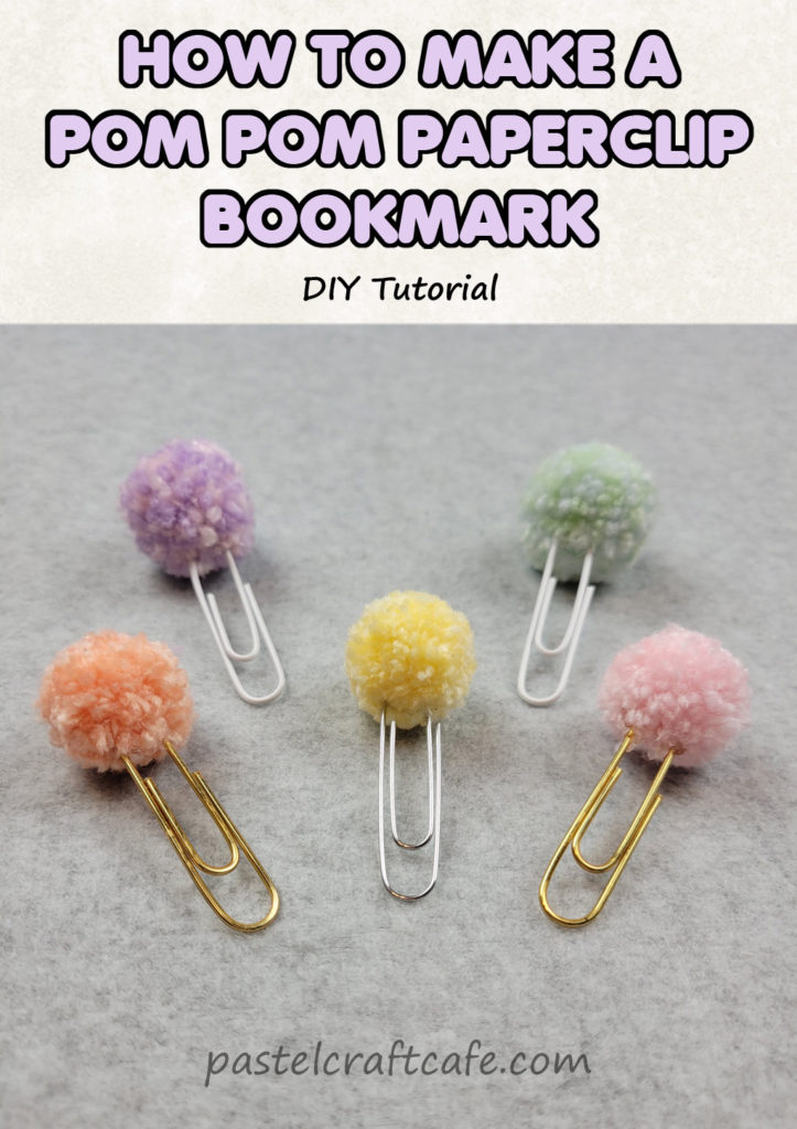 The text "How to make a pom pom paperclip bookmark DIY tutorial" above five paperclips with pom poms attached at the top in various colors