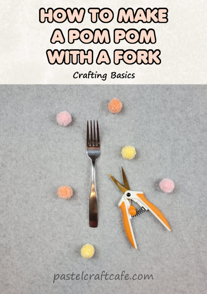 The text "How to make a pom pom with a fork Crafting Basics" above a fork and scissors surrounded by small pom poms in pink, orange, and yellow