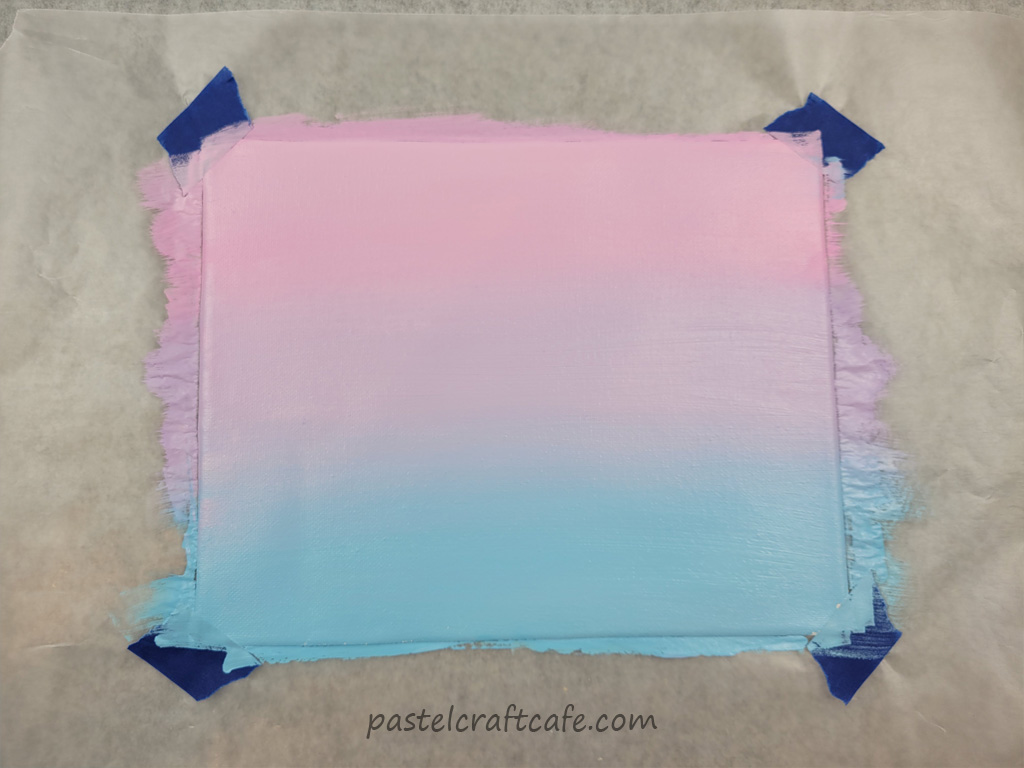 A canvas painted with a gradient pastel background