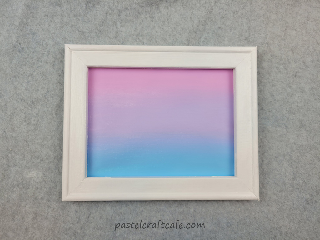 A reverse canvas with the canvas painted with a gradient pastel background