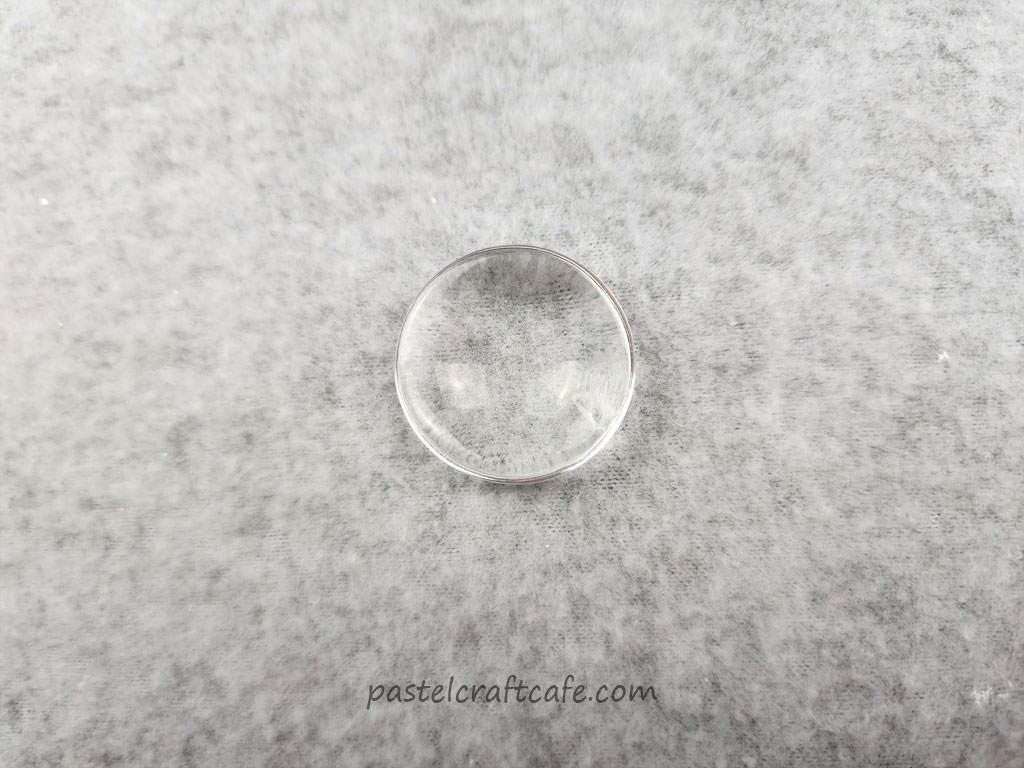 A single clear glass cabochon
